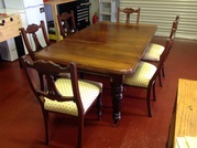 Victorian mahogany dining table plus 6 chairs.